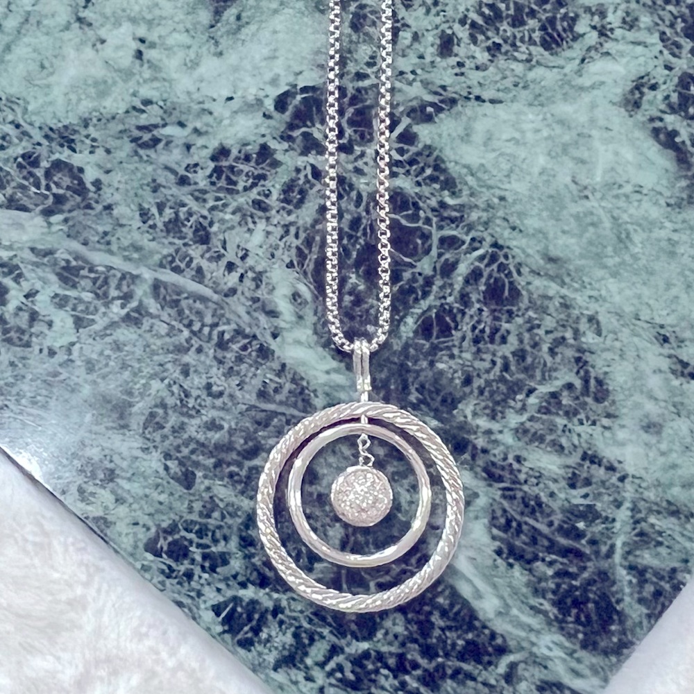 Brighton crystal pendant necklace and matching earrings.